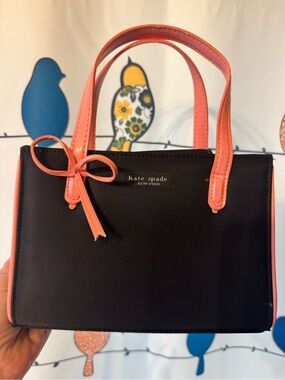 kate spade Black Mini Satchel with Coral Trim and Bow Accent